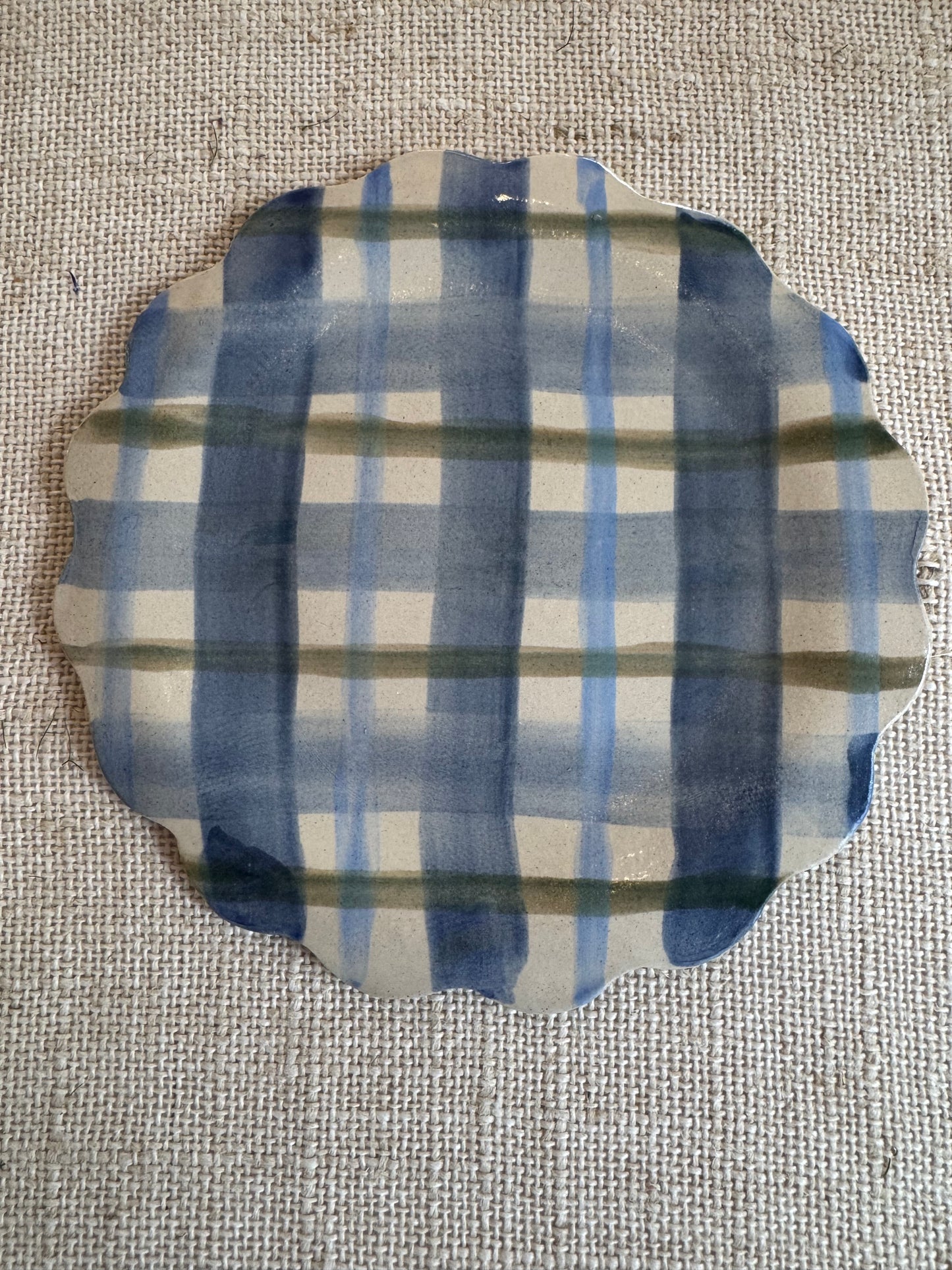 Gingham check hand shaped ceramic plate with scalloped edge