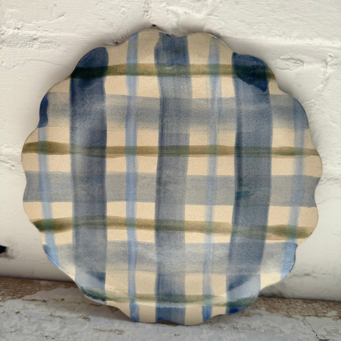 Gingham check hand shaped ceramic plate with scalloped edge