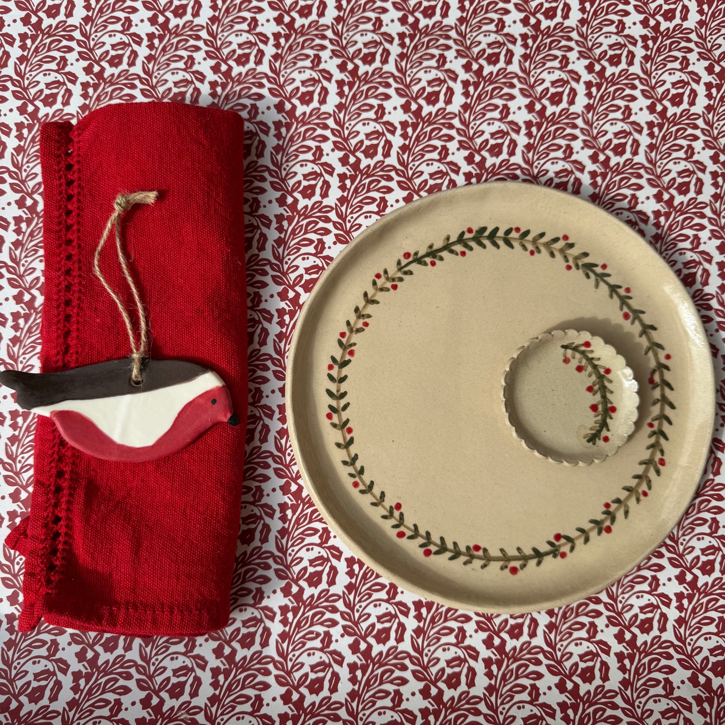 Festive garland round ceramic plates and platters