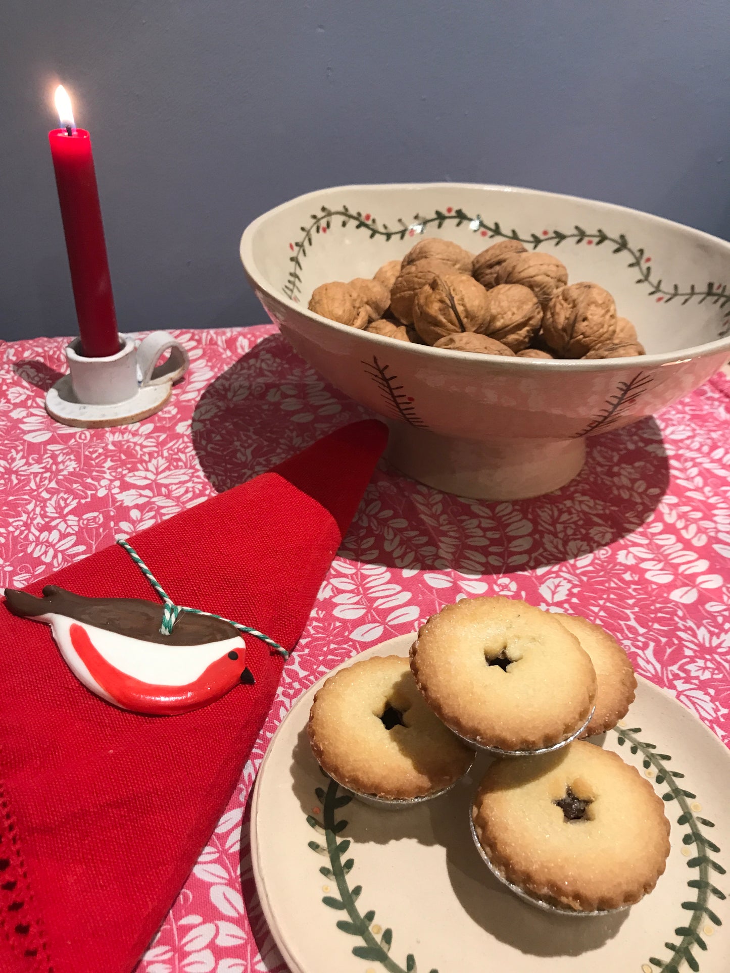 Festive garland round ceramic plates and platters