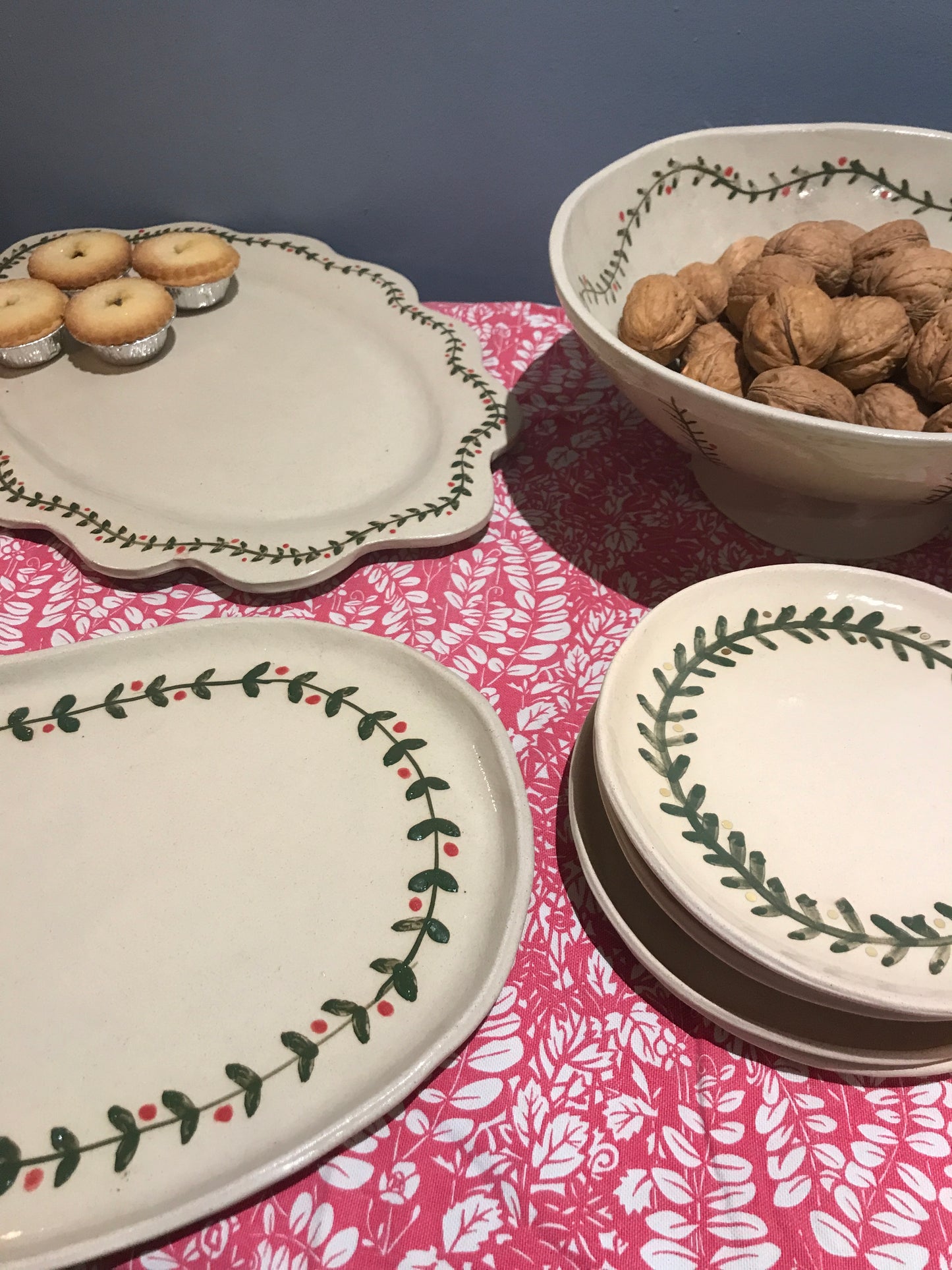 Festive garland round ceramic plates and platters