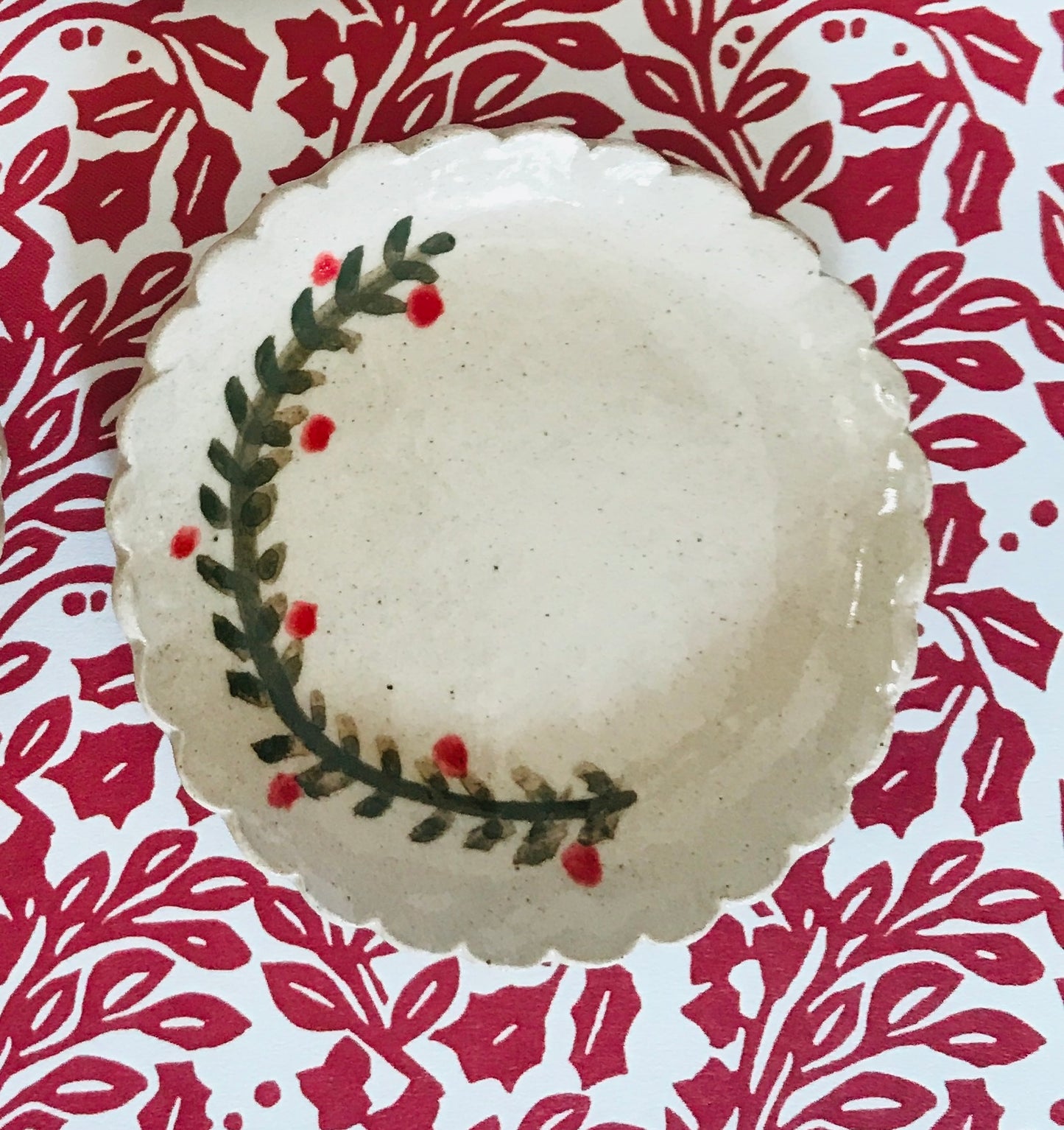 Festive garland round ceramic plates and platters