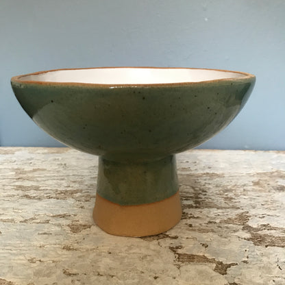 Natural stoneware glazed ceramic raised bowl with speckled glazes