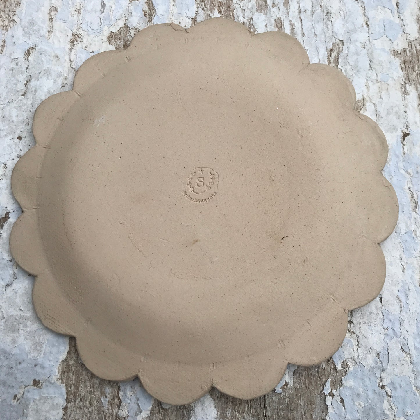 Soft pink and red gingham checked hand shaped ceramic plate with scalloped edge