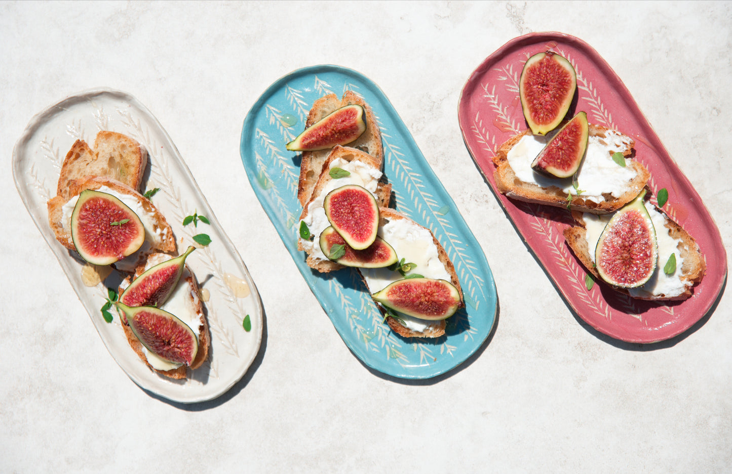 White, rhubarb and pearl pink long oval sgraffito ceramic side dish