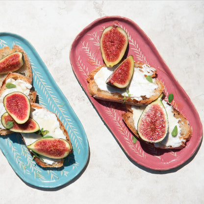 White, rhubarb and pearl pink long oval sgraffito ceramic side dish