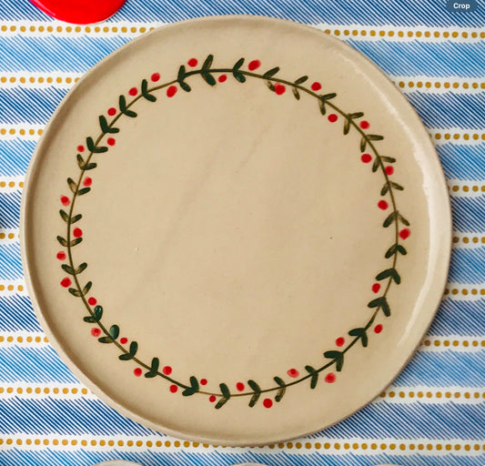 Festive garland round ceramic plates and platters