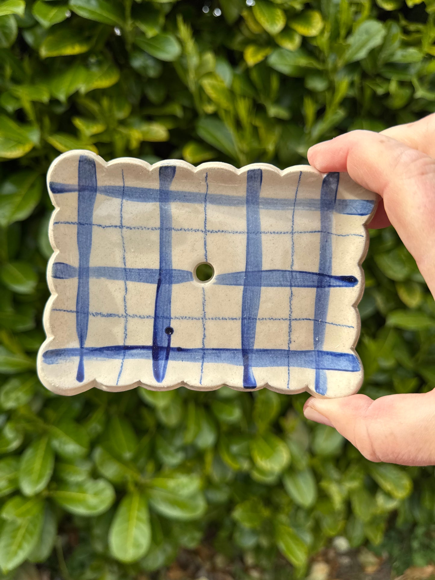 Rectangular scalloped edged soap dish with drainage hole