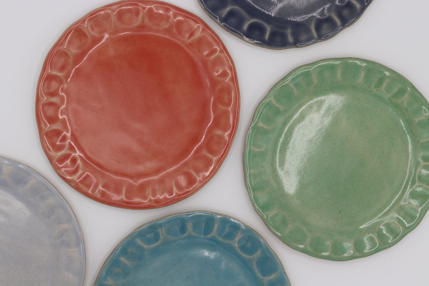 Thumbprint tea plates in french macron coloured glazes