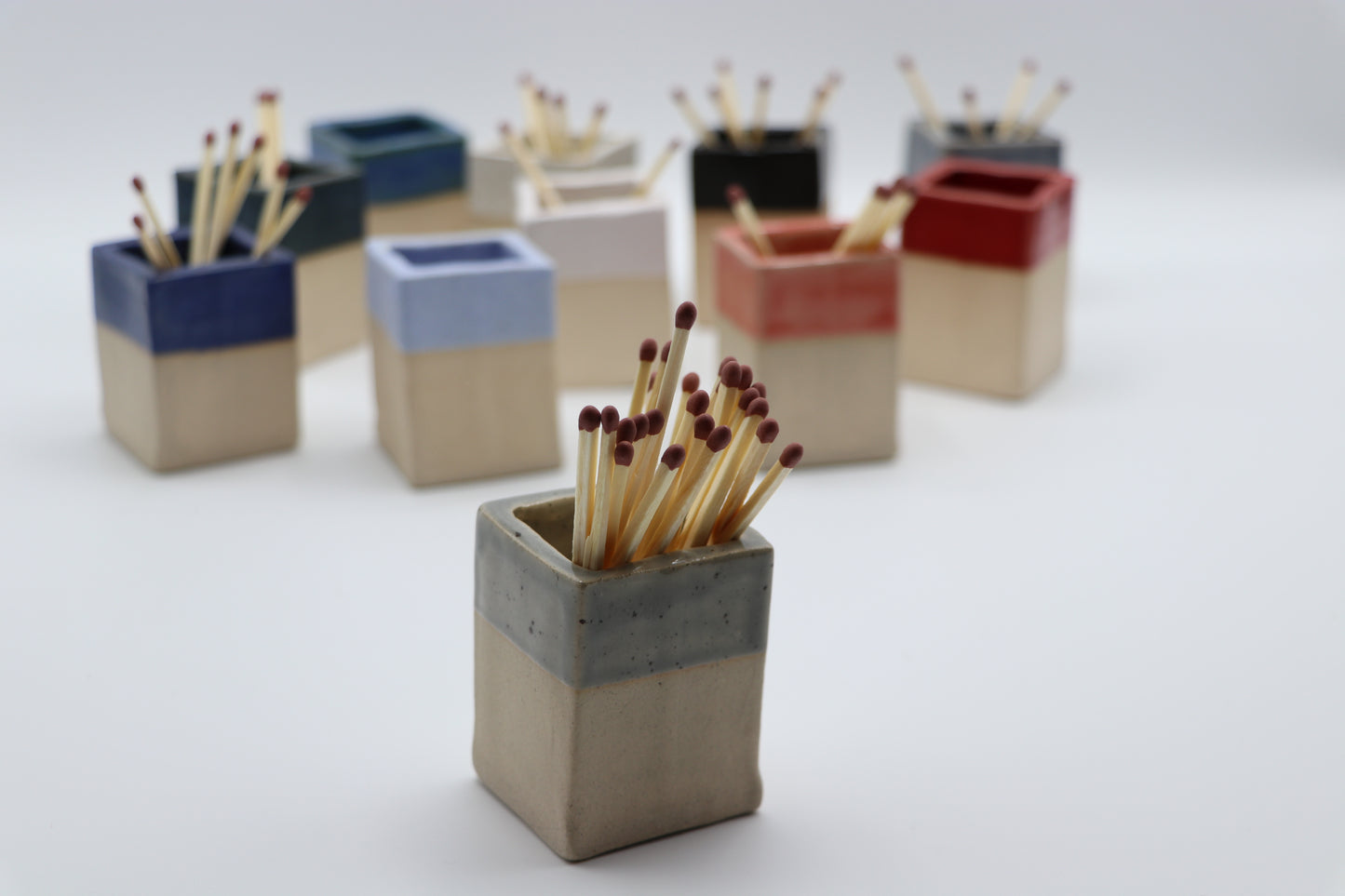 Ceramic match striker pot