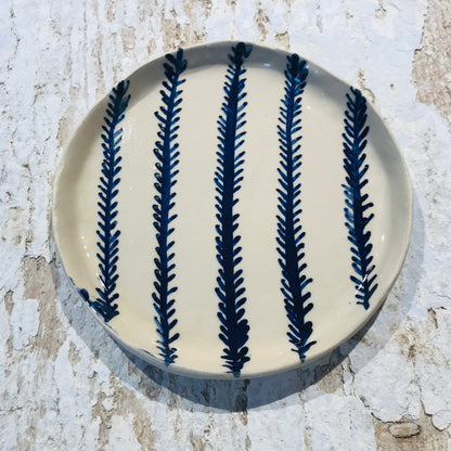 Natural stoneware glazed ceramic plate with hand painted blue leaf garland floral design