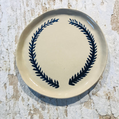 Natural stoneware glazed ceramic plate with hand painted blue leaf garland floral design