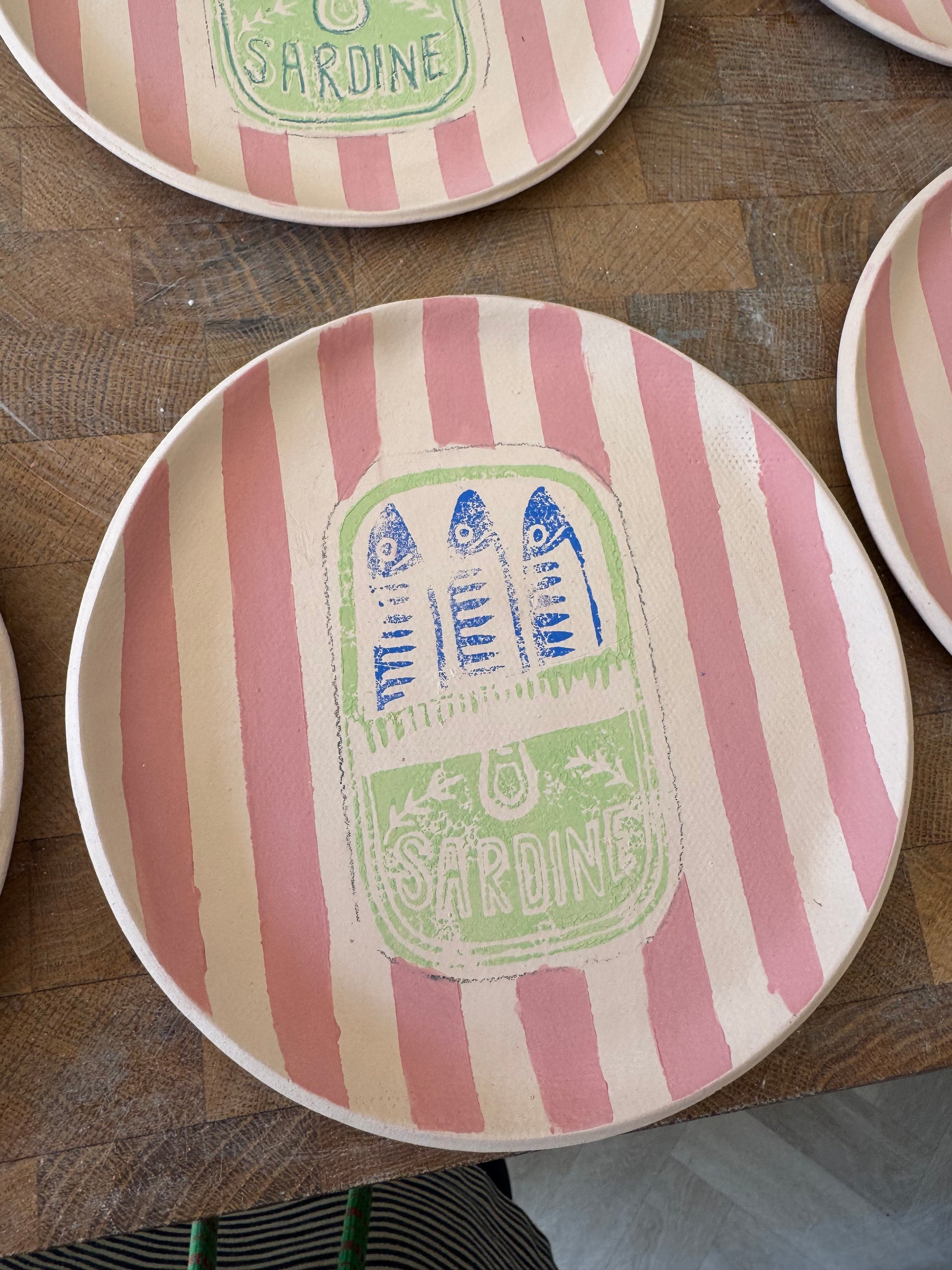 Ceramic sardine tin plate with pink stripes and gold lustre