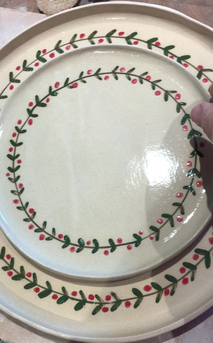 Festive garland round ceramic plates and platters